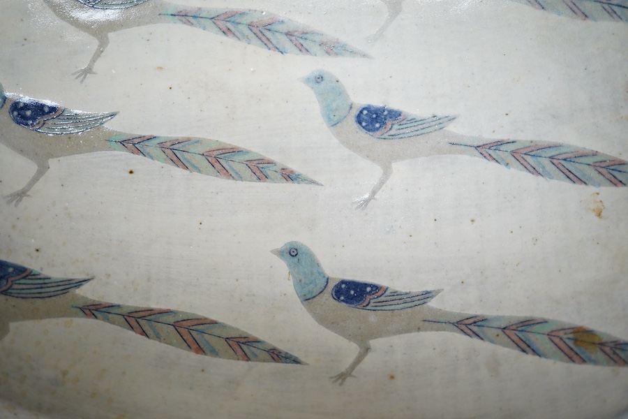 Jill Fanshawe Kato (b.1943), two studio pottery dishes, one decorated with pheasants, impressed marks to the bases, largest 34cm wide